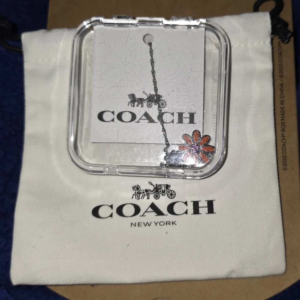 COACH Silver And Orange Daisy Pendant Necklace - Picture 5 of 6